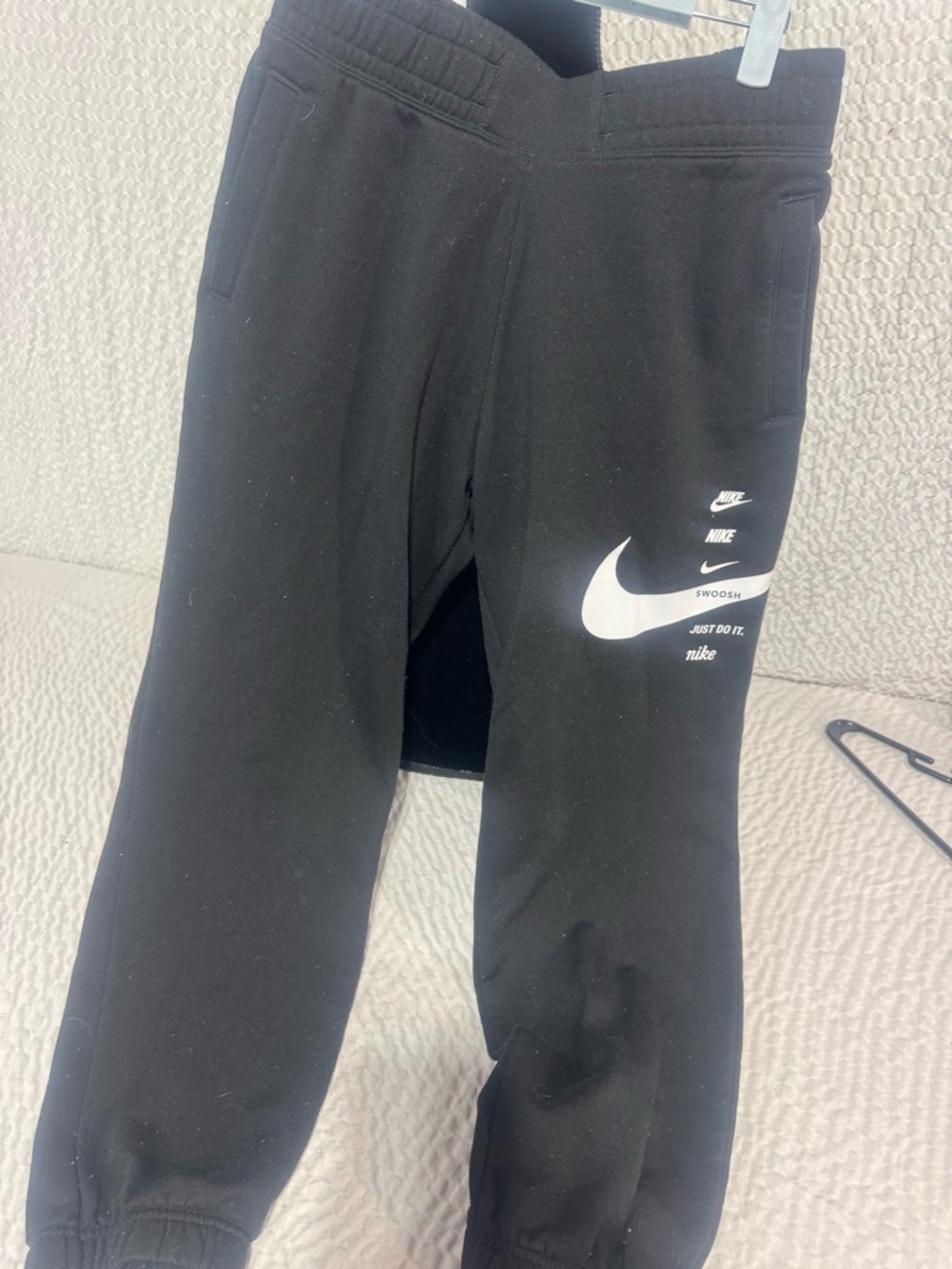 Nike Black Jogger Sweatpants with White Swoosh Logos
